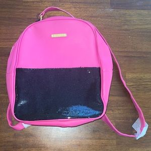 Juicy Couture.NWOT pink and black sequined backpack.